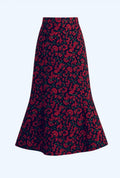 The Skirt. Black cloth, red flower, green stem.